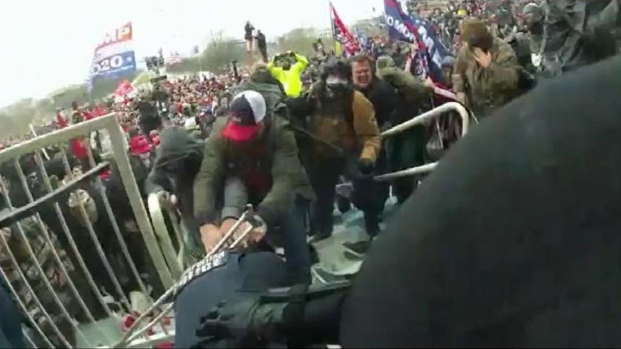 Capitol Rioter Who Dragged Officer By The Neck Into The Mob Said He 'Fed Him To The People'