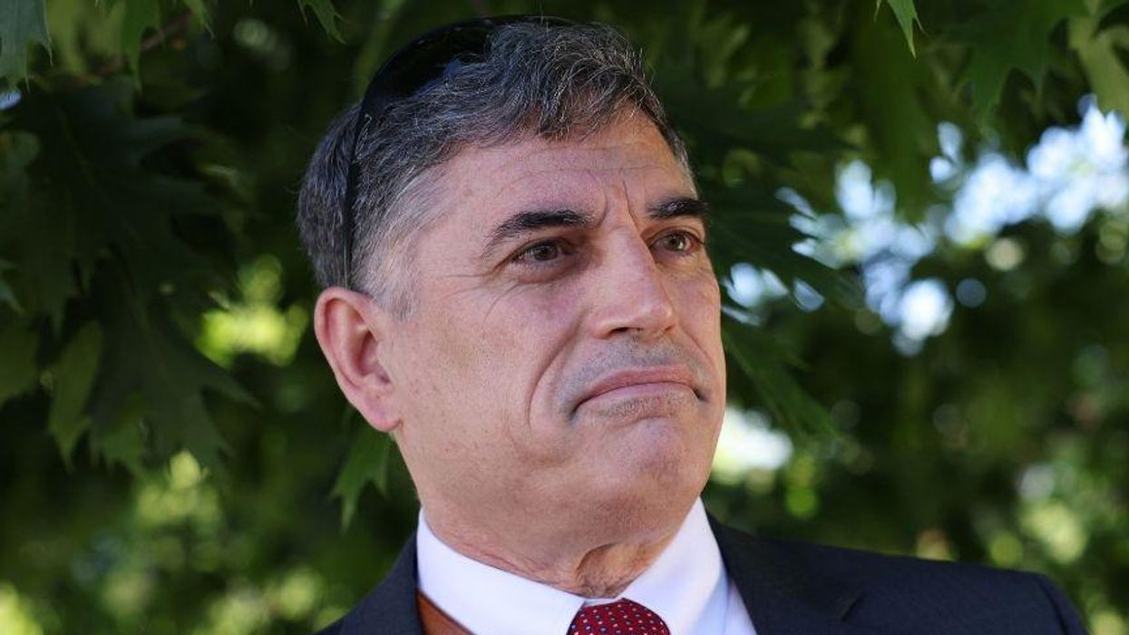 Photo of Insurrection-Denying Congressman Helping Barricade the Door on January 6th Emerges After 'Tourist' Comments