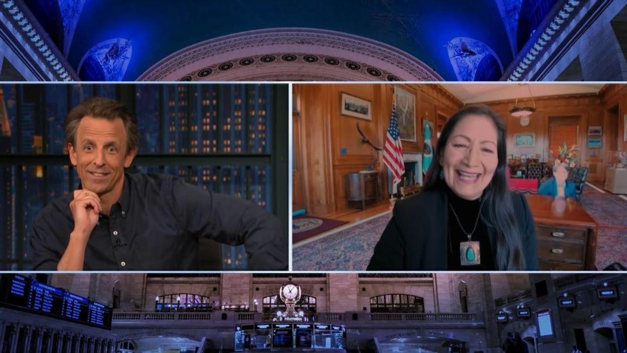 Deb Haaland's 'Seth Meyers' Interview Hilariously Interrupted By Staffer Crawling On The Floor Behind Her