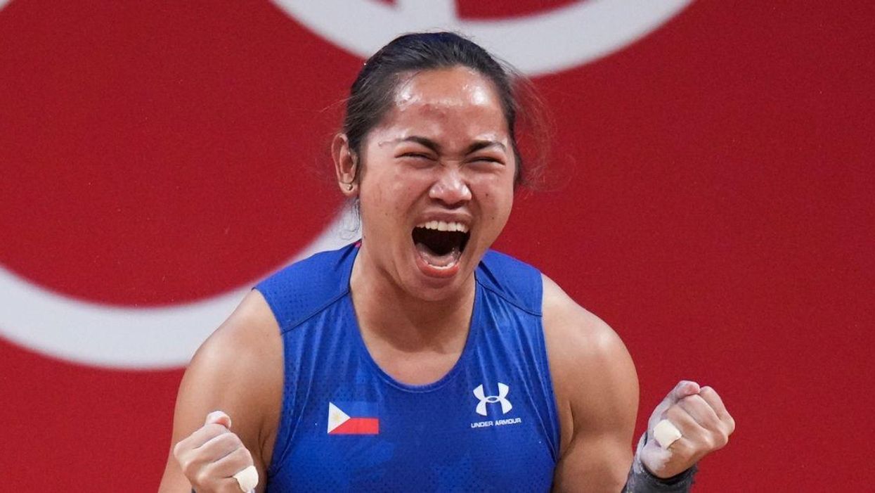 Weightlifter Who Won Philippines' First Ever Gold Medal Plans To 'Eat A Lot' After Win—And Girl, Same