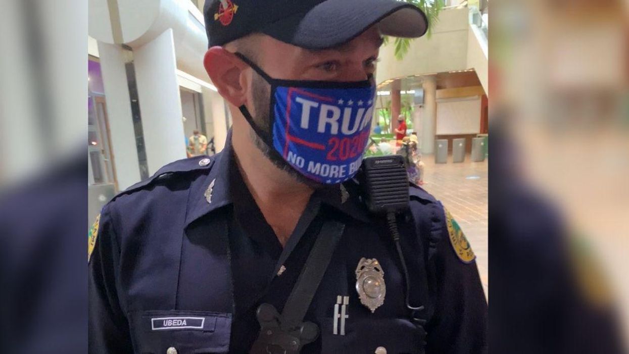 Pro-Trump Miami Cop Suspended After Allegedly Flashing 'White Power' Hand Signal In Photo