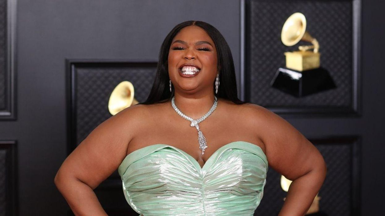 Lizzo Sends Fans Into A Frenzy With Her Hilariously NSFW Reason For Missing The VMAs