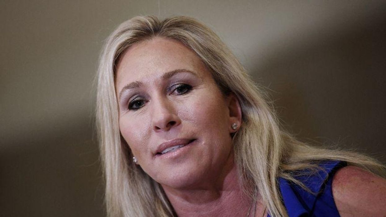 QAnon Rep. Expresses Support for 'Nonviolent' Capitol Rioter Caught Beating Police Officer