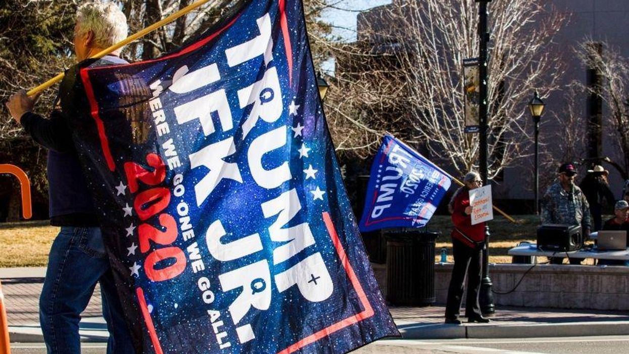 The QAnon Believers Camping Out in Dallas for JFK Jr. Are Basically a Religious Cult Now—and It's Terrifying