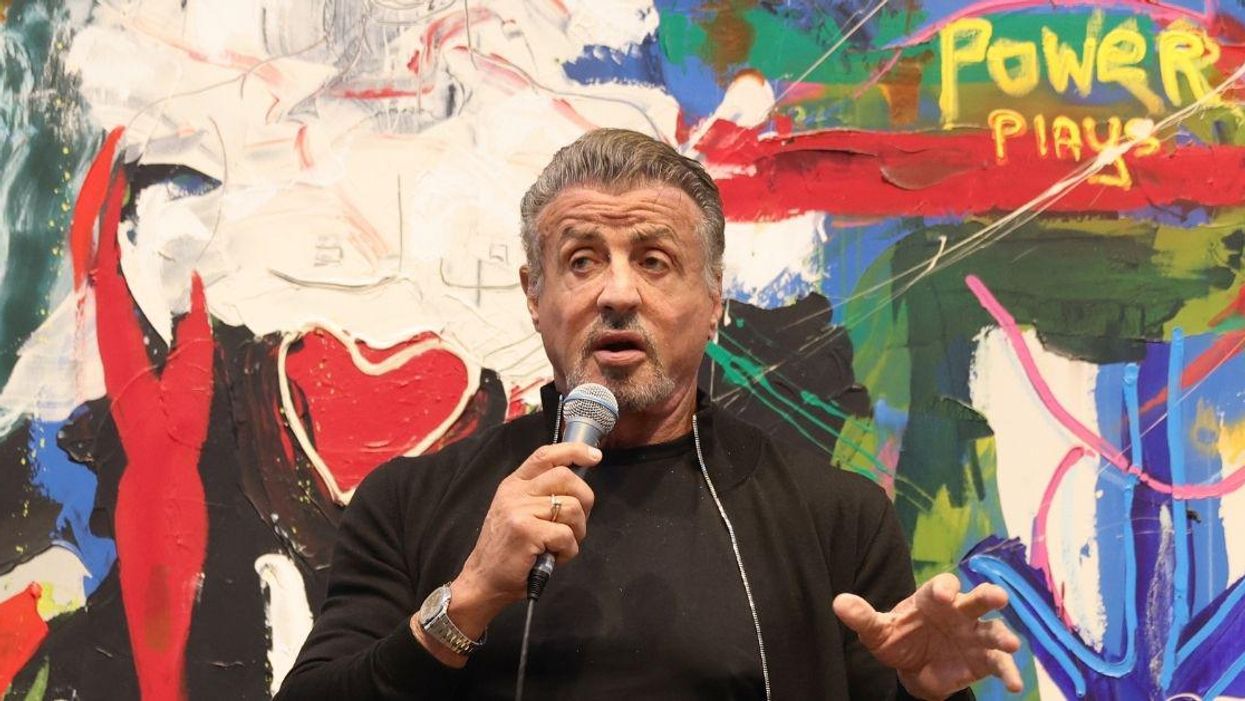 QAnoners Overjoyed After Sylvester Stallone Seemingly Confirms He's One Of Them With Photo