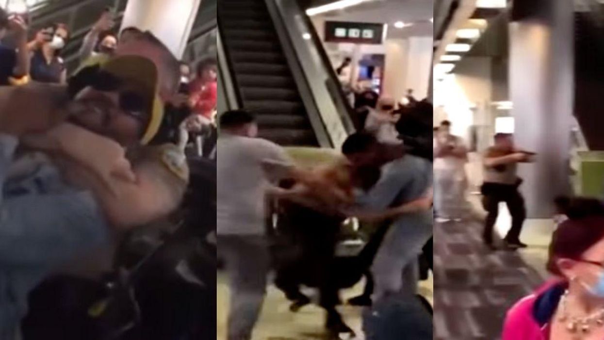 Airport Cop Pulls Gun On 'Unruly Passenger' After Video Shows Him Biting Him On The Head