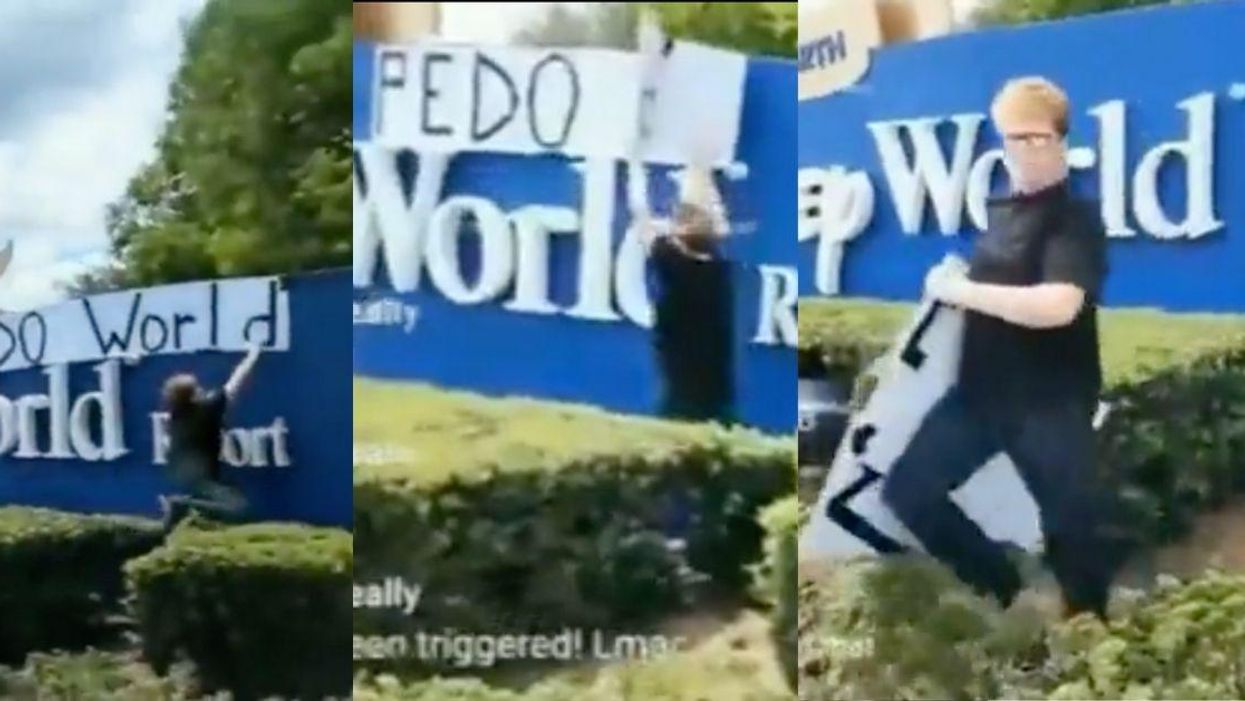 Anti-Gay Protesters Throw Tantrum After Woman Rips Down Their 'Pedo World' Sign At Disney