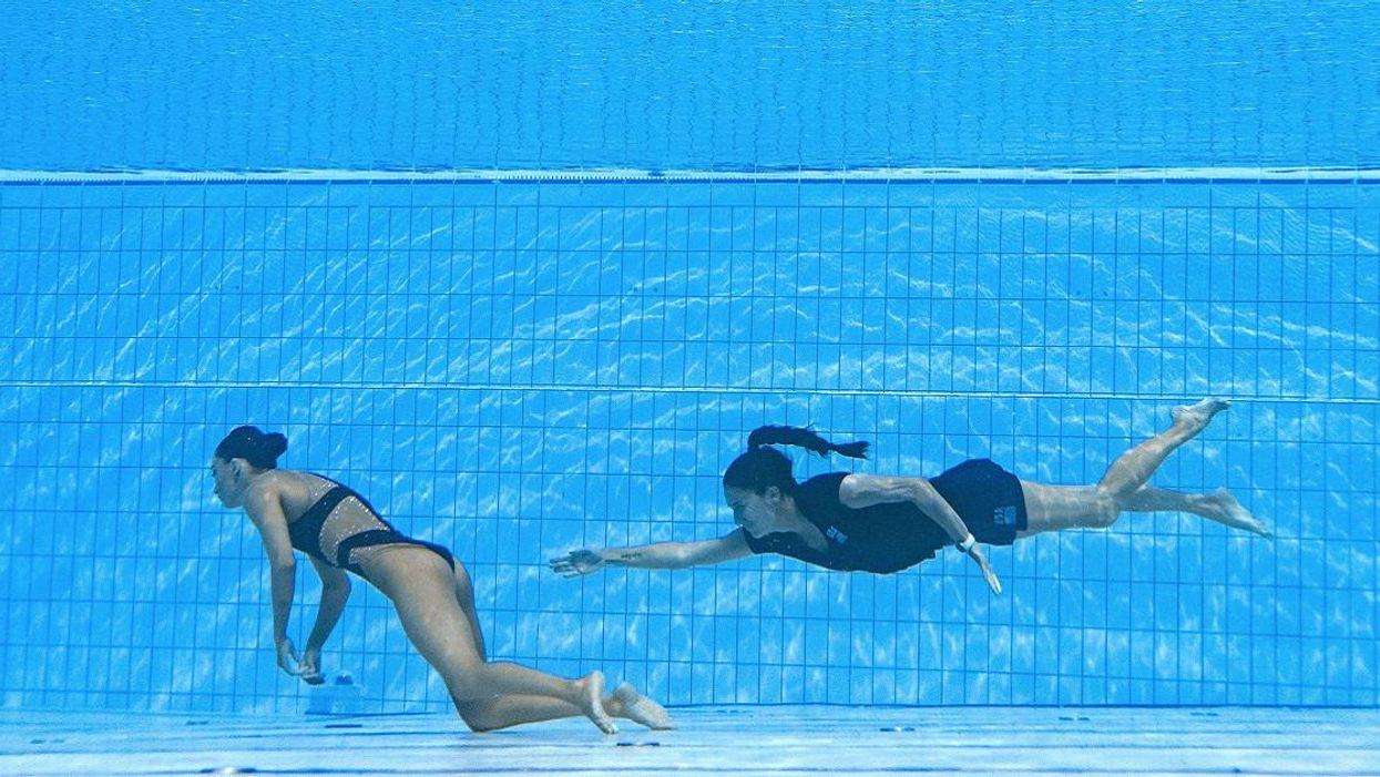 Coach Dives In To Save Drowning U.S. Swimmer Who Blacked Out Underwater During World Championships