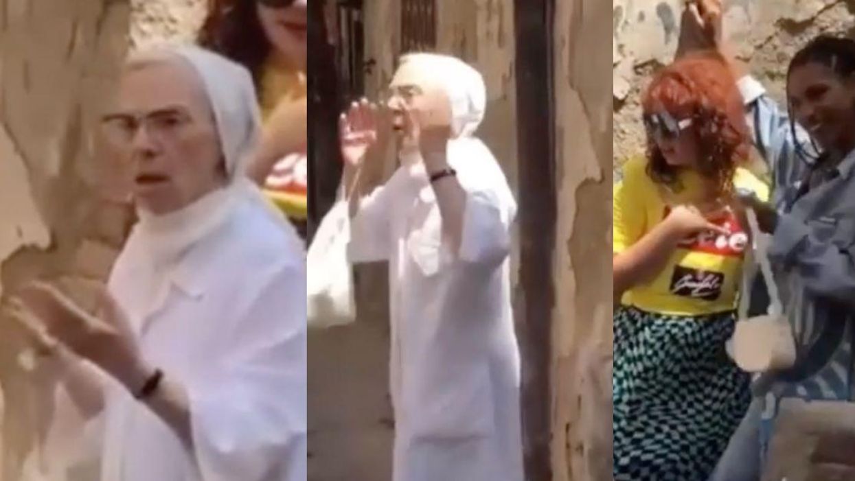 Outraged Nun Goes Viral After Interrupting Photoshoot Of Two Female Models Kissing On Street