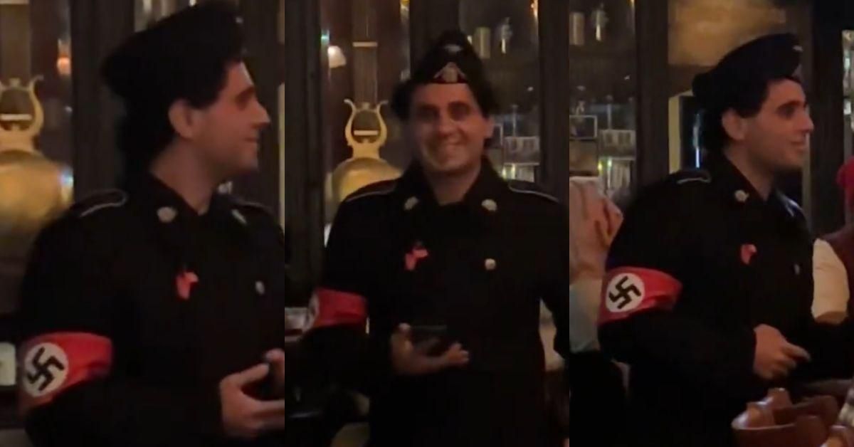 Grinning Man Shows Up To NYC Bar In Full Nazi Uniform—And It Went As Well As You'd Expect