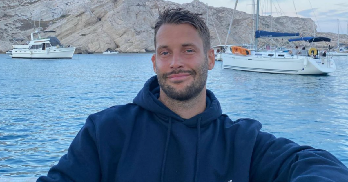 Fashion Designer Claps Back After Homophobic Troll Shames Him For Kissing Husband On Instagram
