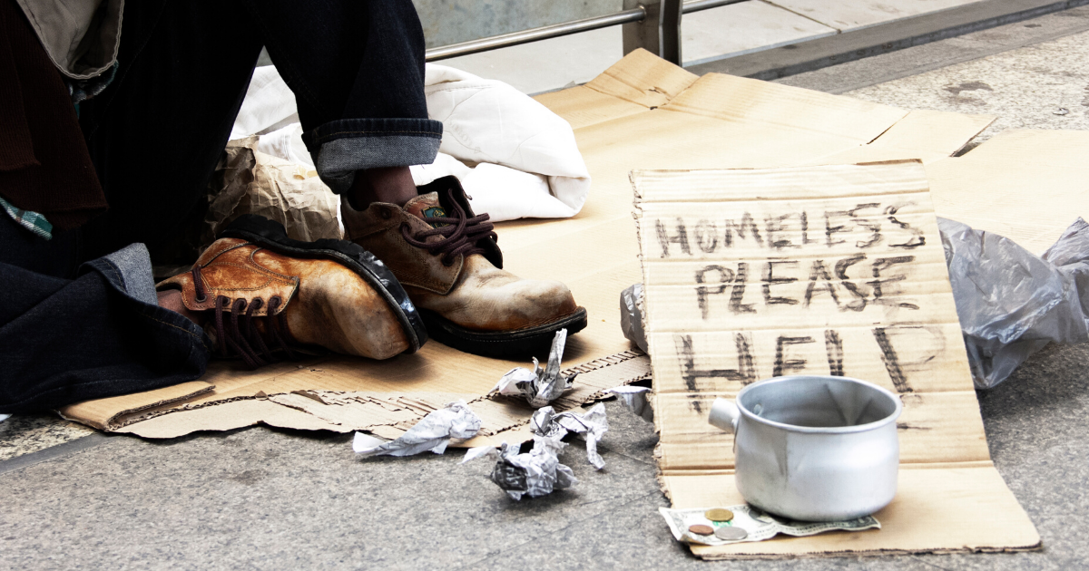 Alabama Cops Apologize After Backlash For Posing With 'Homeless Quilt' Made Out Of Signs They Took From Homeless People