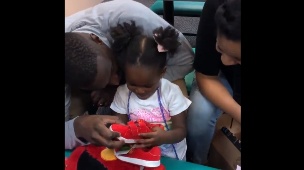 This 2-Year-Old's Unfiltered Reaction To Her New 'Elmo' Shoes Is Pure Joy