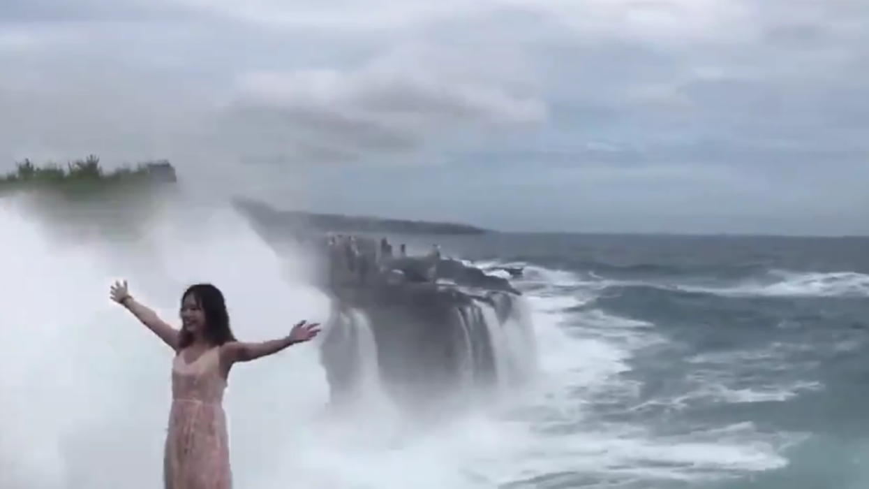 This Viral Video Of Giant Wave Crashing Into Unsuspecting Tourist Has Everyone Saying 'Ouch'