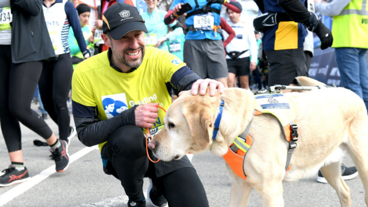 This Blind Runner And His Guide Dogs Just Made Marathon History