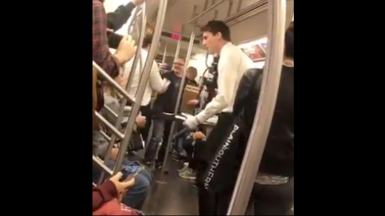 Passengers Experience 'First Class' Subway Ride With Strangers Serving Hot Towels And Sparkling Cider