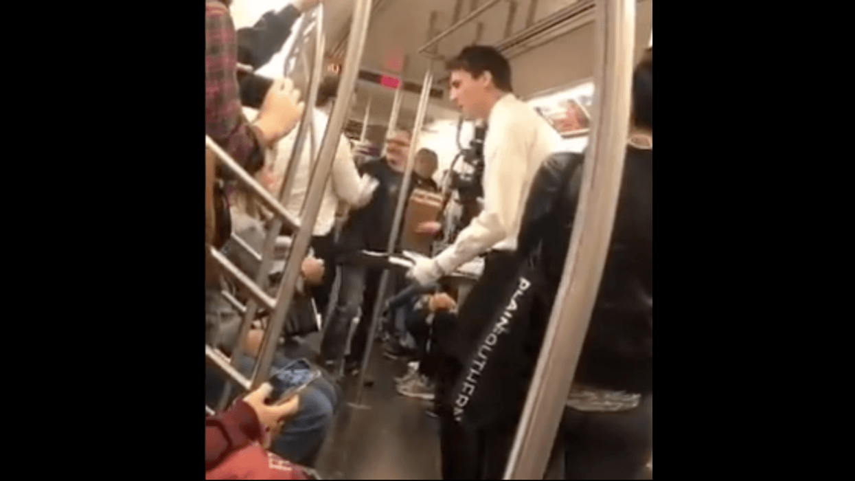 Passengers Experience 'First Class' Subway Ride With Strangers Serving Hot Towels And Sparkling Cider