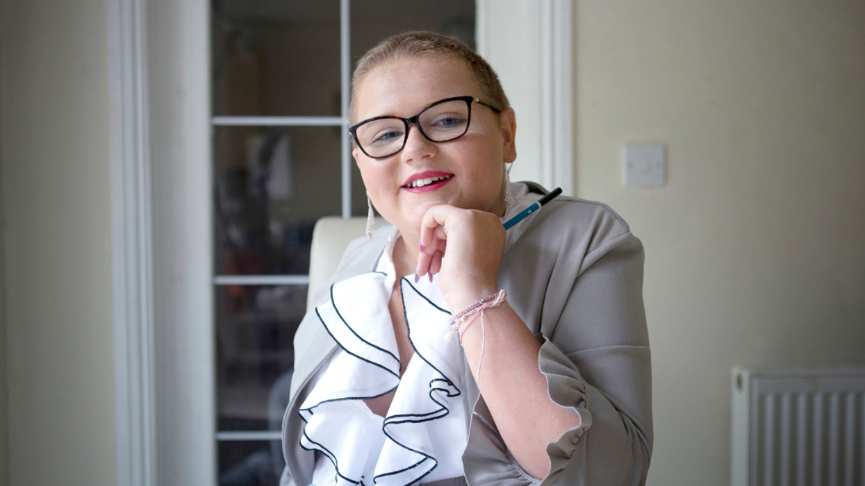 14-Year-Old Girl Who Lost Her Arm To Cancer Wins Competition With Her First Left-Handed Artwork