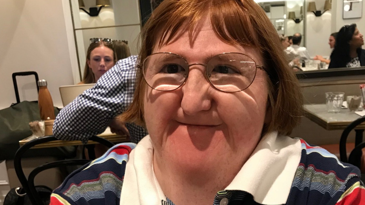 Disabled Writer Goes Viral After Combating Online Trolls' Mean Comments With Cheerful Selfies