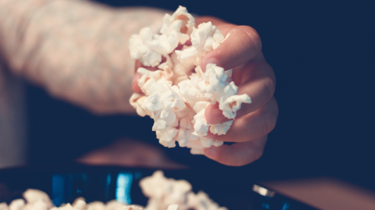 Man's Decision To Make Some Popcorn While His Neighbors Fight Backfires Splendidly