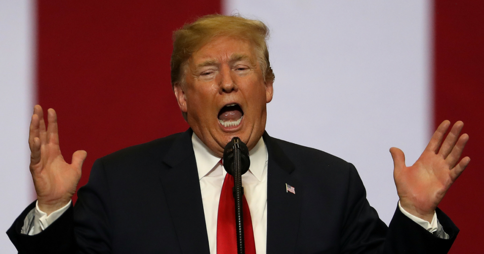 Donald Trump Is Getting Dragged for His Latest Tweet About Putin and Hillary--Guess Whose Side He's On