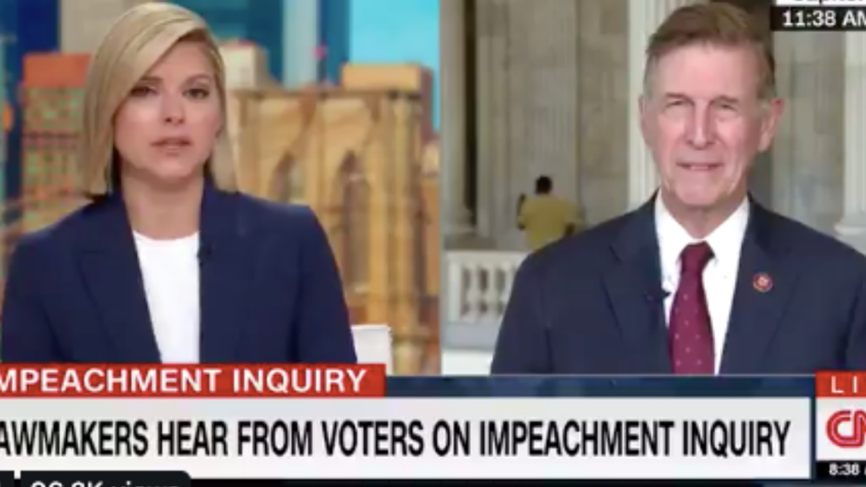 Guy Decides That The Background Of A CNN Interview Is The Perfect Place To Practice Martial Arts