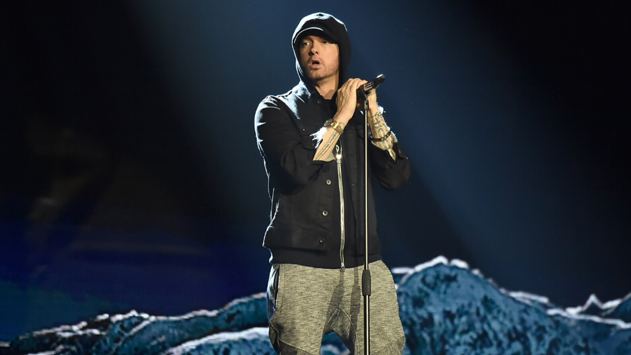 Grindr Just Threw Some Iconic Shade At Eminem's Attempt At The Dolly Parton Challenge
