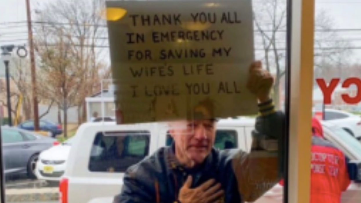 New Jersey Nurse Explains Story Behind Powerful Picture She Took Of Man Thanking ER Staff For Saving His Wife's Life