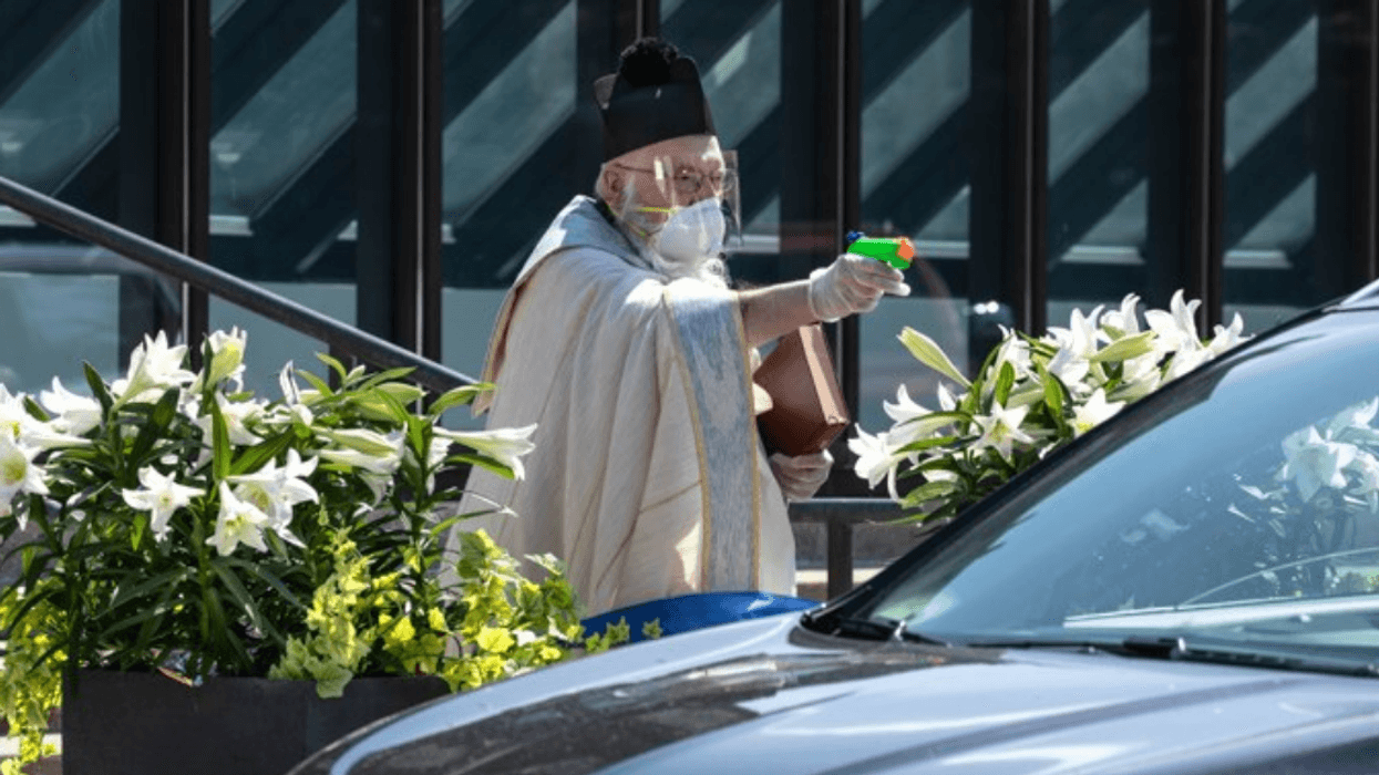 Michigan Priest Becomes A Meme Sensation After Shooting His Parishioners With A Water Gun Full Of Holy Water