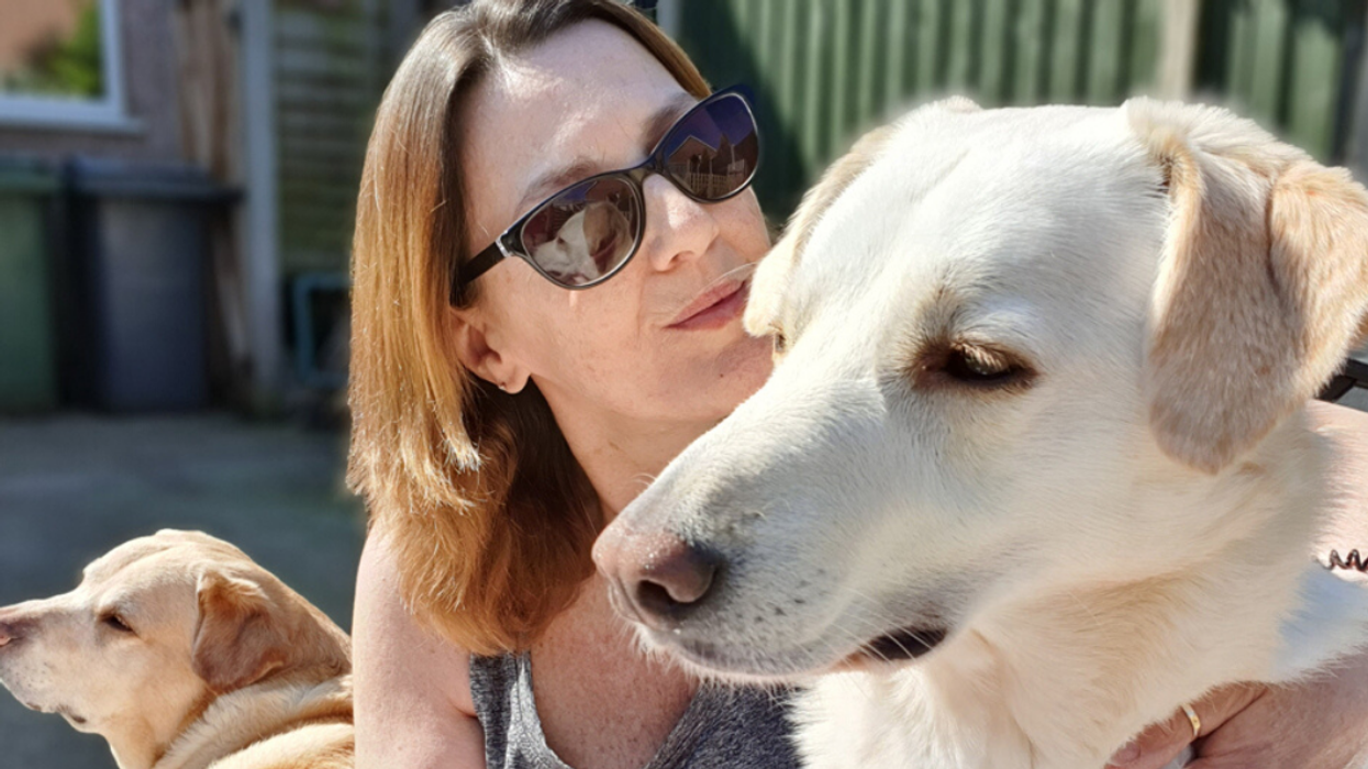 Woman Who Credits Her Labrador With Saving Her Life By Spotting Her Cancer Opens Up Training School To Honor Him