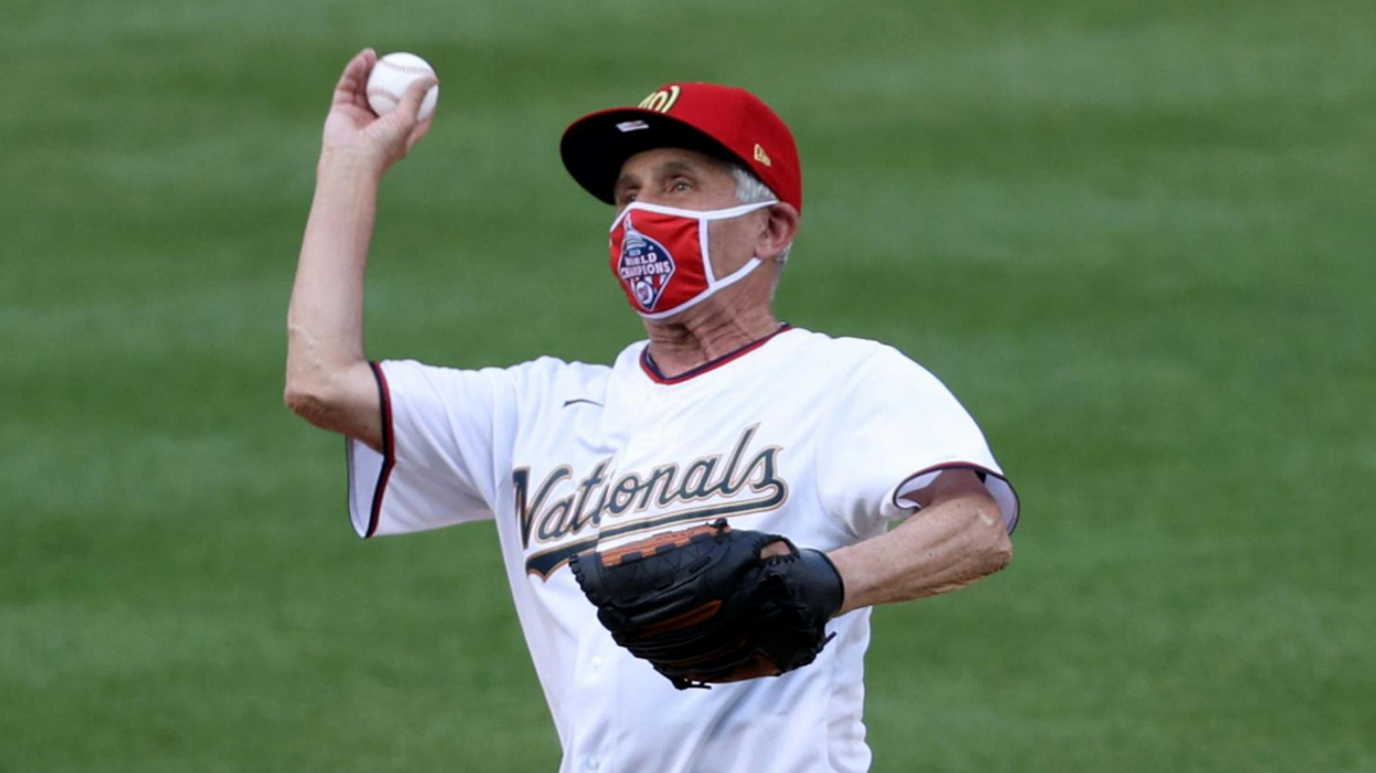 Dr. Fauci Threw Out The First Pitch On Opening Day—And Let's Just Say He Should Stick To Medicine
