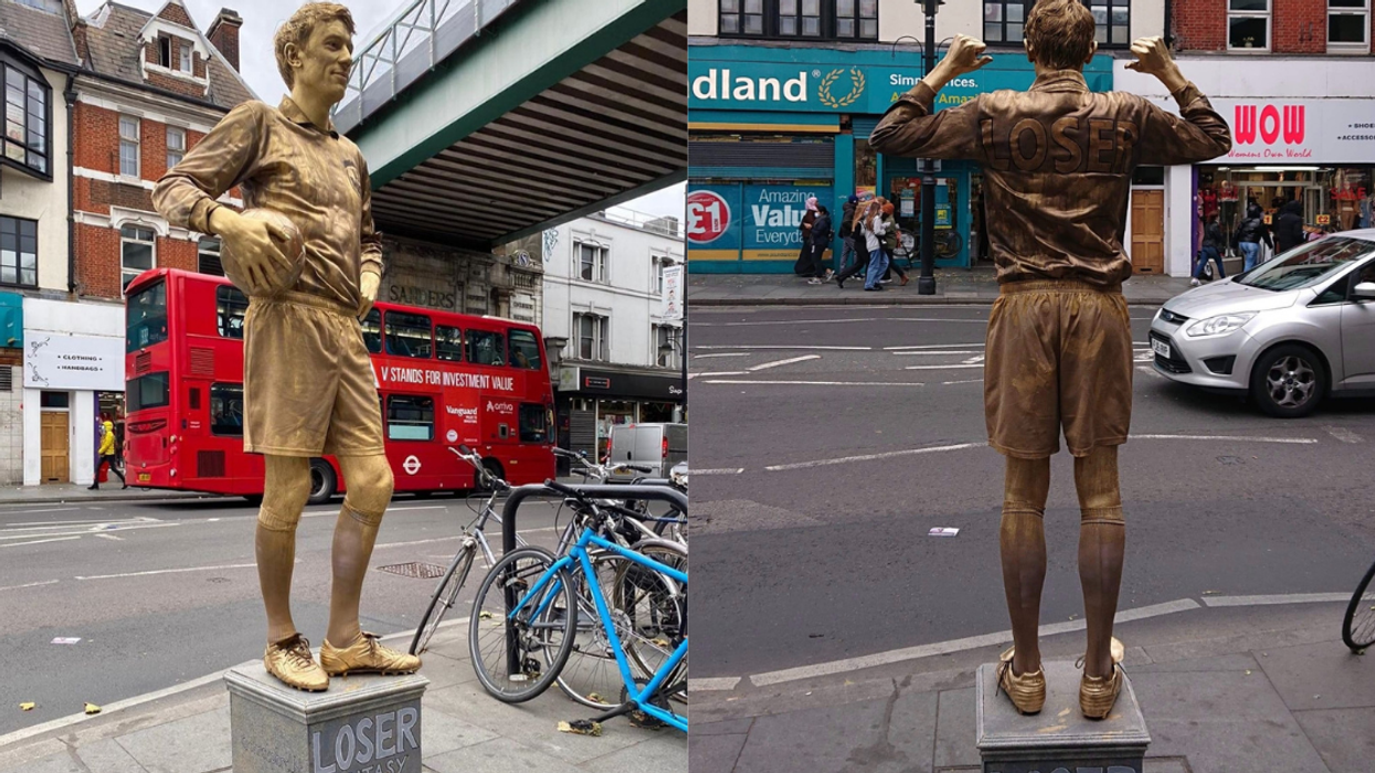 Guy Loses Fantasy Soccer Wager—And Has To Pose For Hours As A Human 'Loser' Trophy