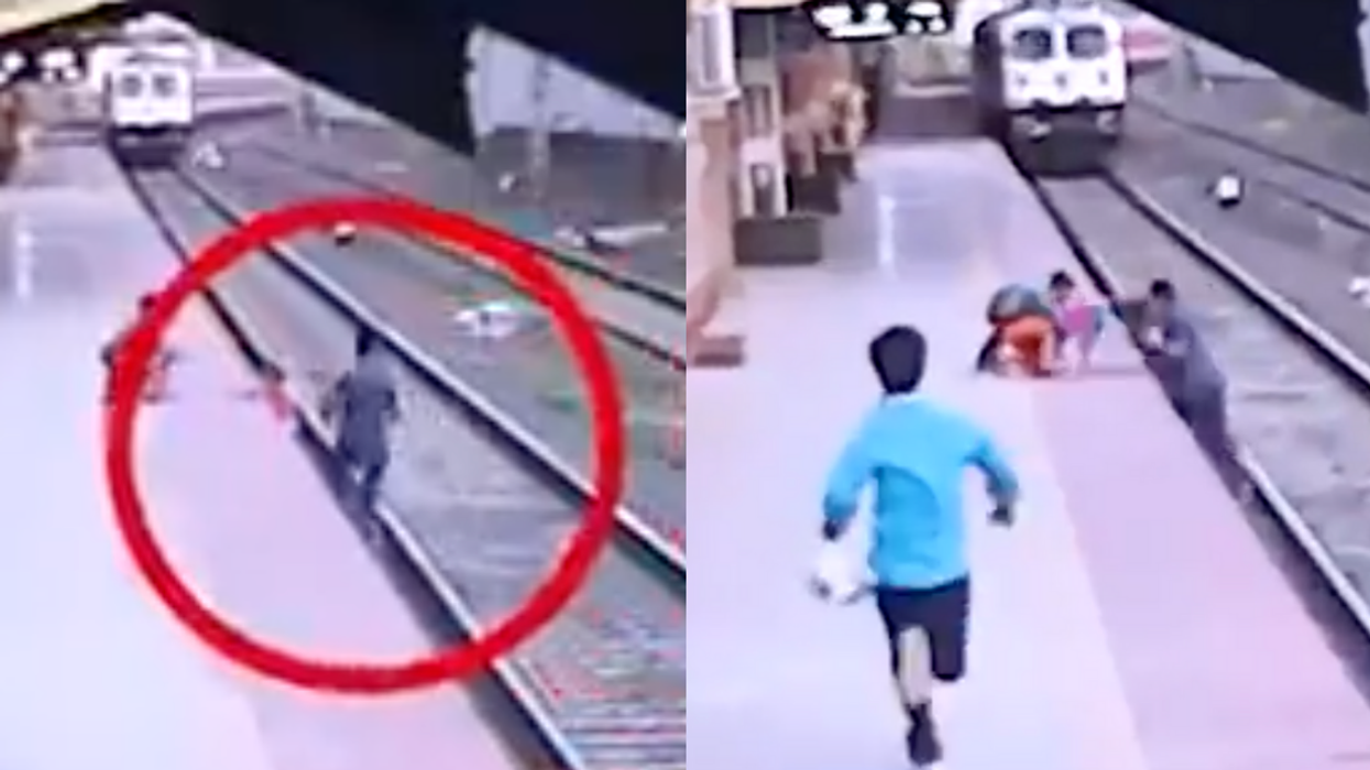 Man Rushes To Save Child Who Fell Onto Train Tracks With Just Seconds To Spare In Heart-Stopping Video