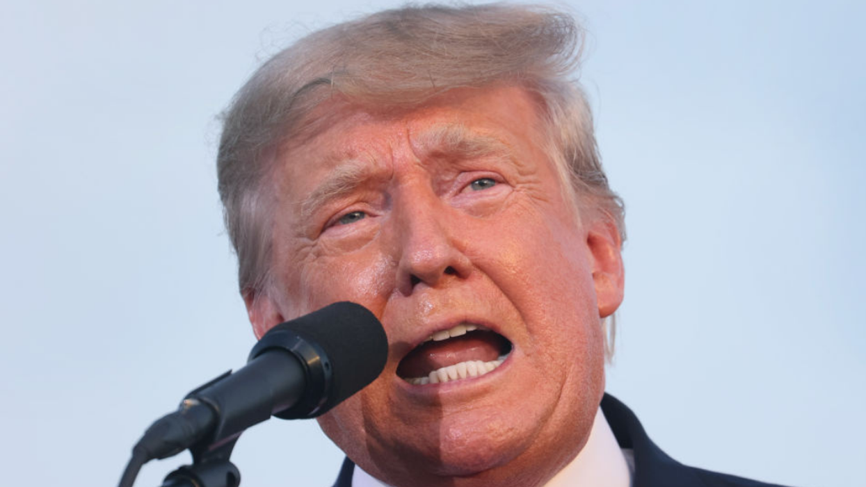 QAnoners Absurdly Convinced Trump Is Still In The White House Thanks To Reflection In Oval Office Photo