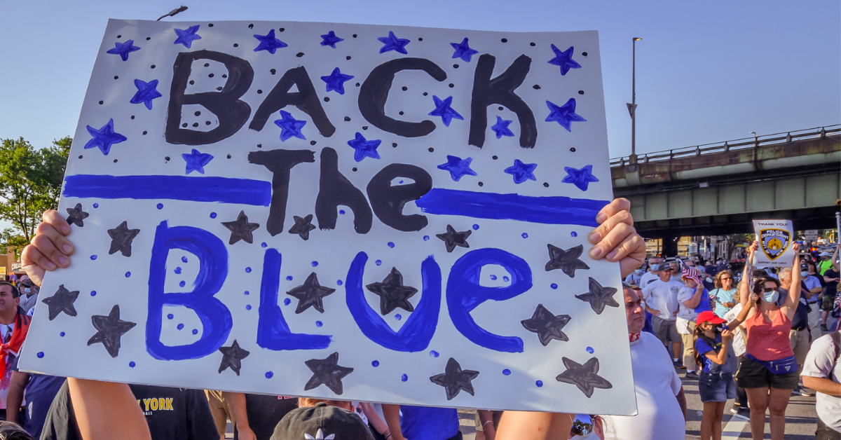 Woman Charged With Hate Crime For 'Smirking' At Utah Deputy And Destroying 'Back The Blue' Sign
