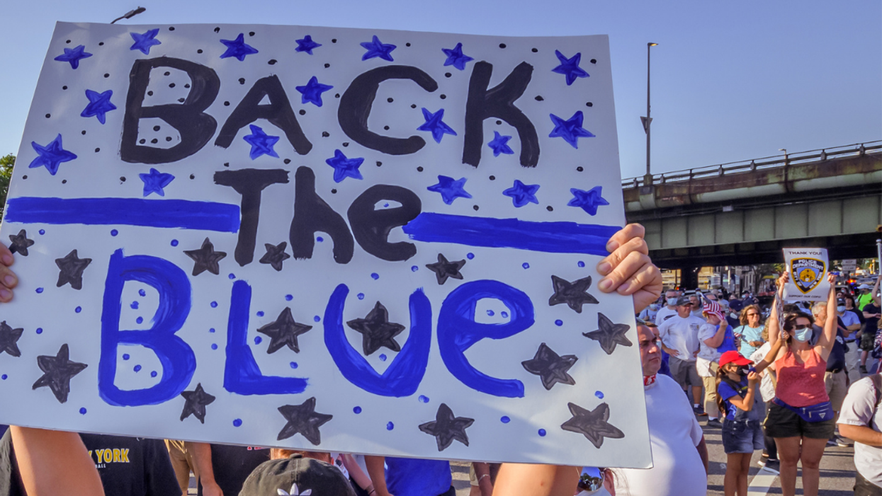 Woman Charged With Hate Crime For 'Smirking' At Utah Deputy And Destroying 'Back The Blue' Sign