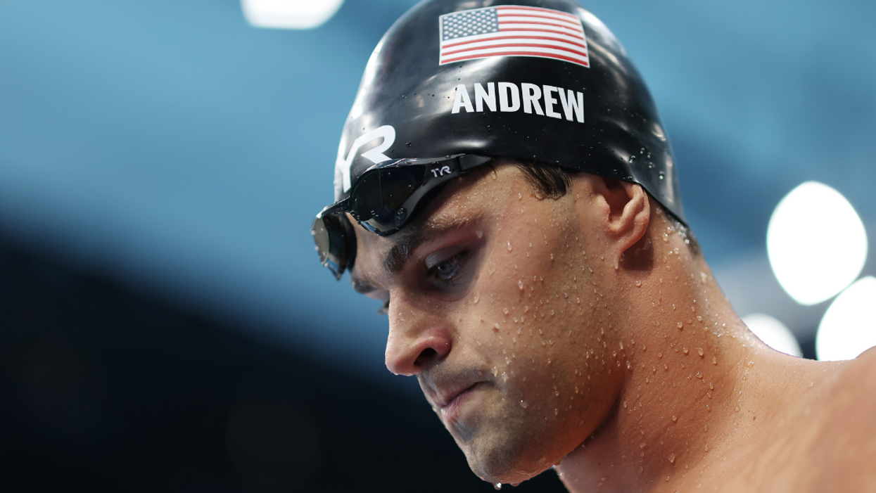 Officials Review Unvaccinated U.S. Swimmer's Behavior After He Refuses To Wear Mask While Talking To Media