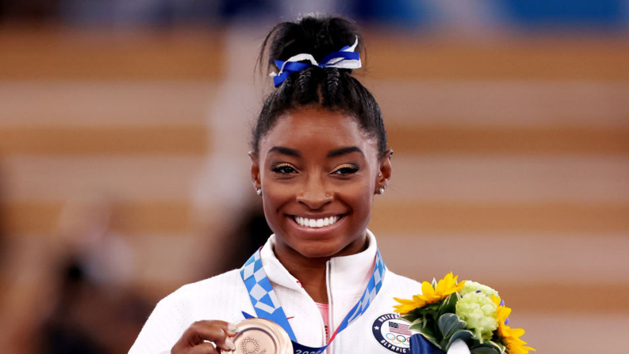 Simone Biles Claps Back At Critic Who Accused Her Of Not Caring About Foster Kids Over Pro-Choice Message