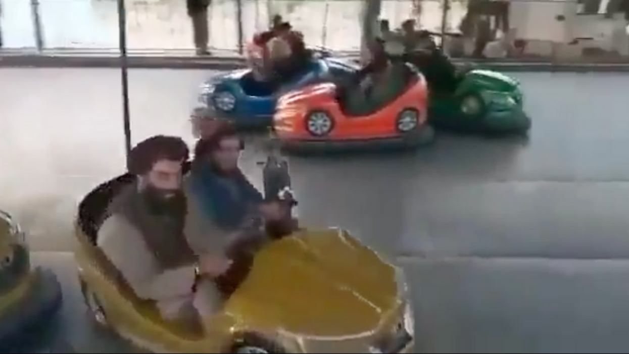 Video Of 'Taliban Soldiers' Riding Around In Bumper Cars At Afghan Amusement Park Stuns Viewers