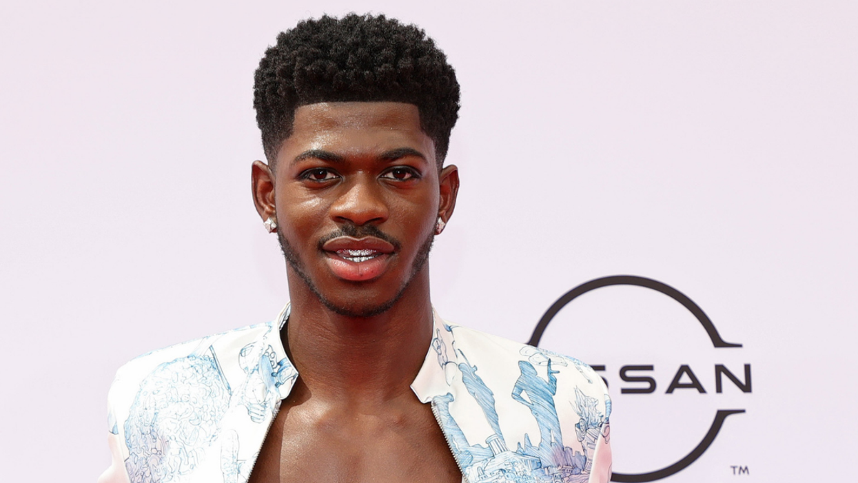 Lil Nas X Shares Hilarious 'Pregnancy' Photoshoot To Announce Album—Complete With Ultrasound