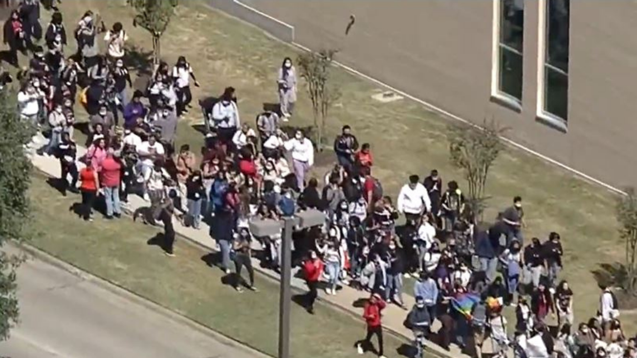Students Stage Massive Walkout After Lesbian Teacher Is 'Marched Off Campus' Over 'Safe Space' Sticker