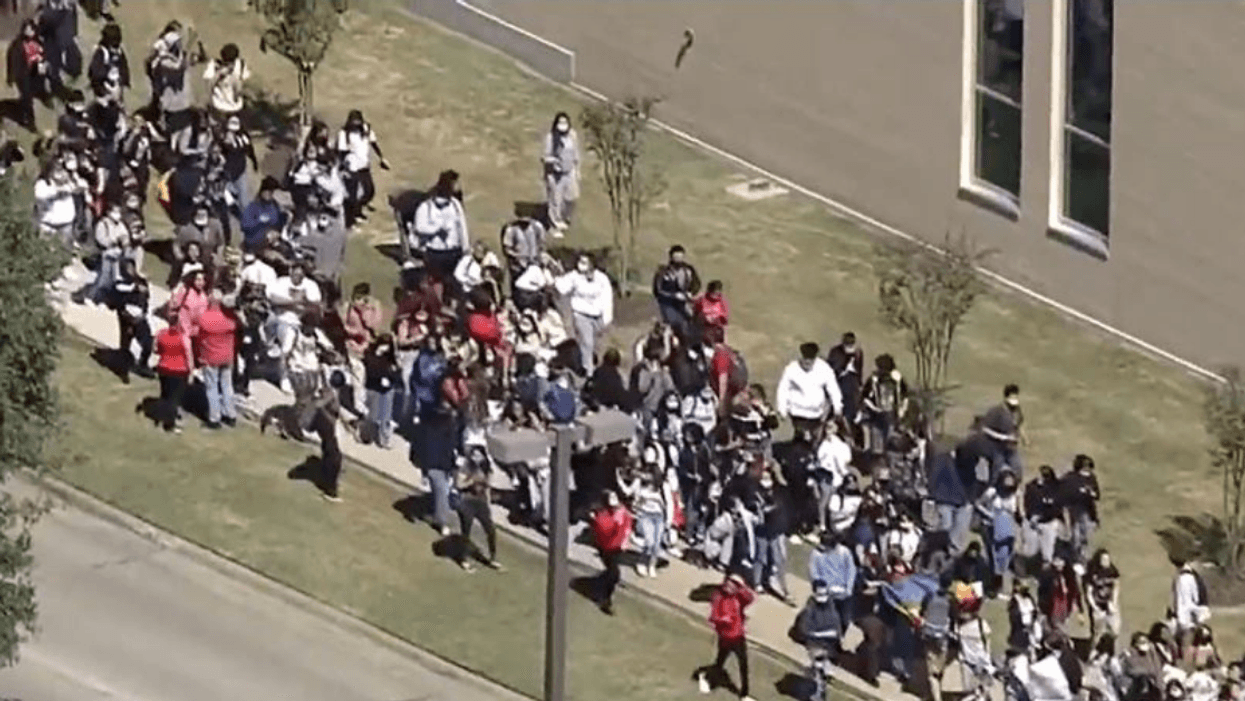 Students Stage Massive Walkout After Lesbian Teacher Is 'Marched Off Campus' Over 'Safe Space' Sticker