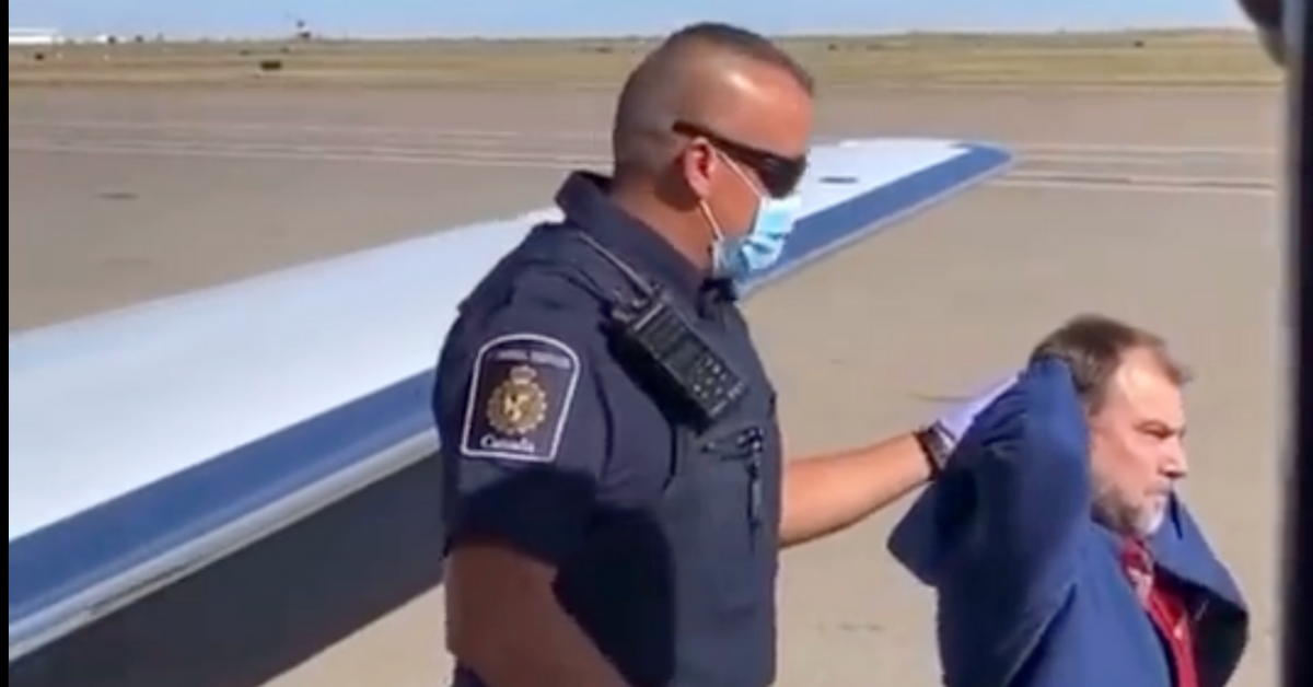 MAGA Pastor Arrested On Tarmac After Returning From 4-Month Tour Of Spreading COVID Conspiracies