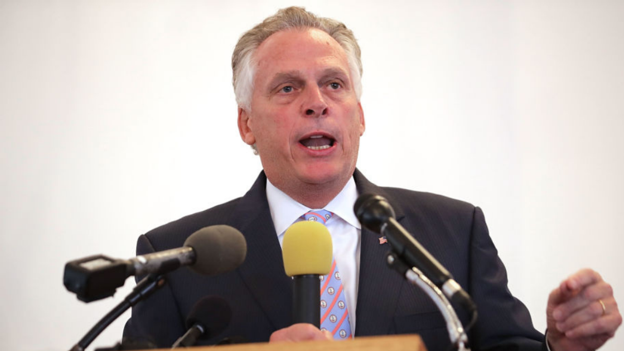 Terry McAuliffe Masterfully Trolls GOP Opponent By Handing Out Toni Morrison Books At Biden Rally