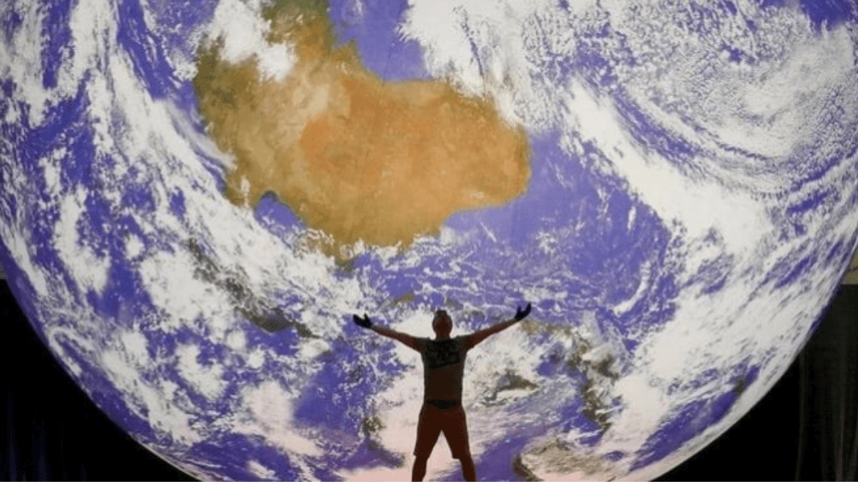 'Floating Earth' Sculpture Deflates And Sinks Due To Bad Weather—And It's Truly A Cringey Metaphor