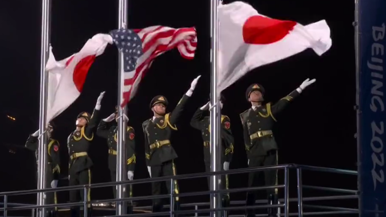 Olympics Fans Can't Get Over The Dramatic Presentations Of The Flags During The Medal Ceremonies