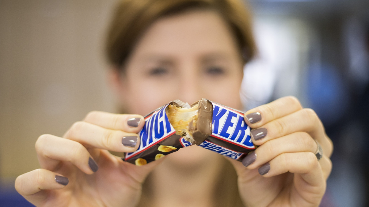 Snickers Hilariously Shuts Down NSFW Rumor They Removed The 'D*ck Vein' From Their Candy Bar