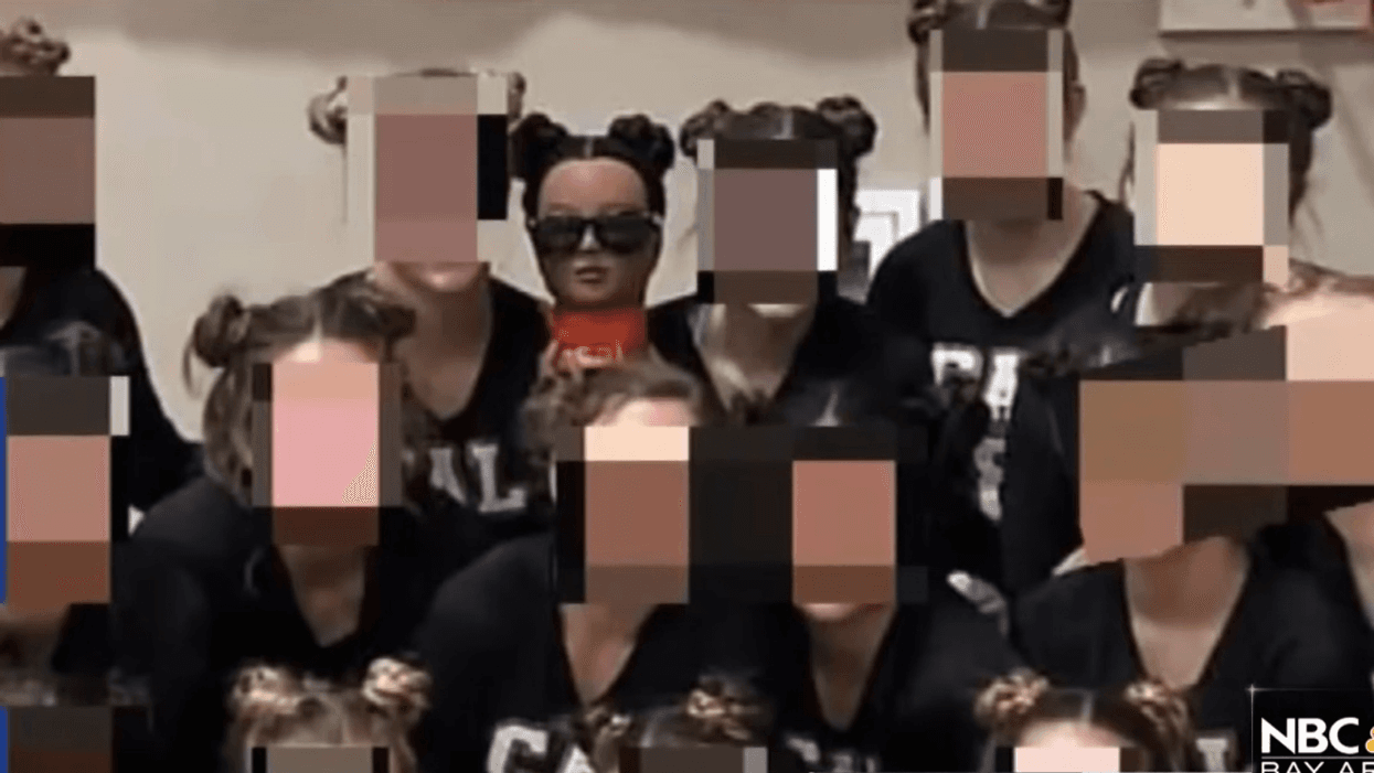 All-White Cheer Squad Sparks Outrage After Using Black Mannequin Head As Their 'Mascot'