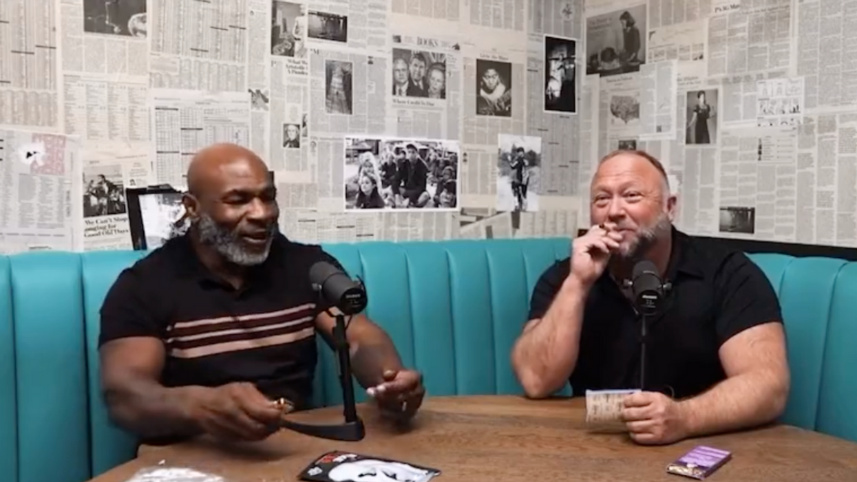 Alex Jones Asks Mike Tyson To Broker Peace With Putin While They Smoke 'Magic Tobacco' In Bonkers Video