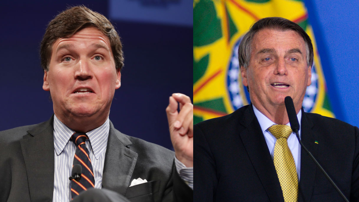 Tucker Carlson Called Out For Wearing Indigenous Headdress In Photo With Brazilian President